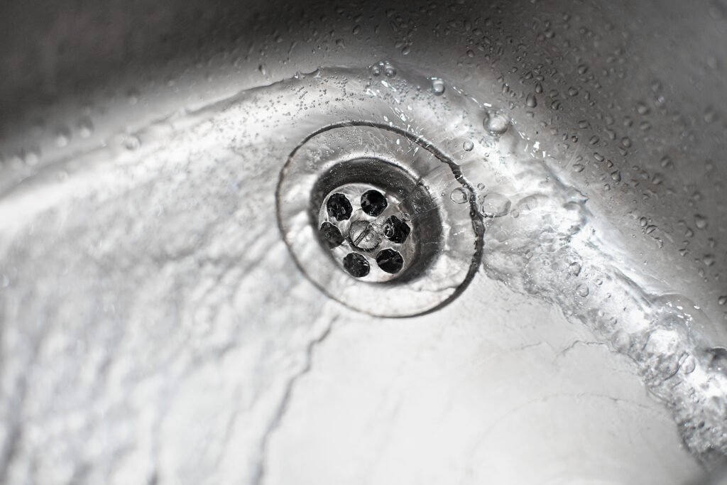 swirl water going down sink